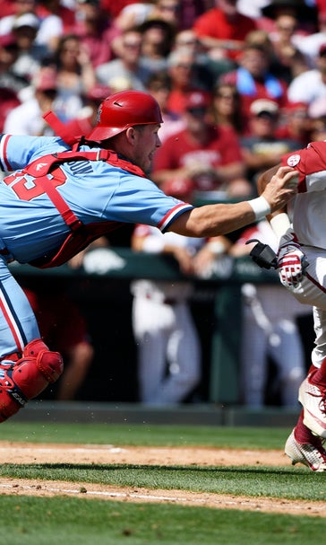Arkansas pounds Ole Miss 14-1, earns return to CWS